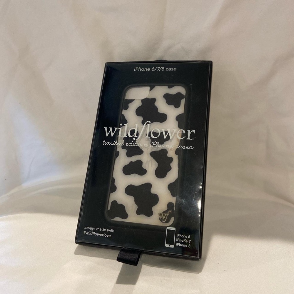 cow print wildflower phone case